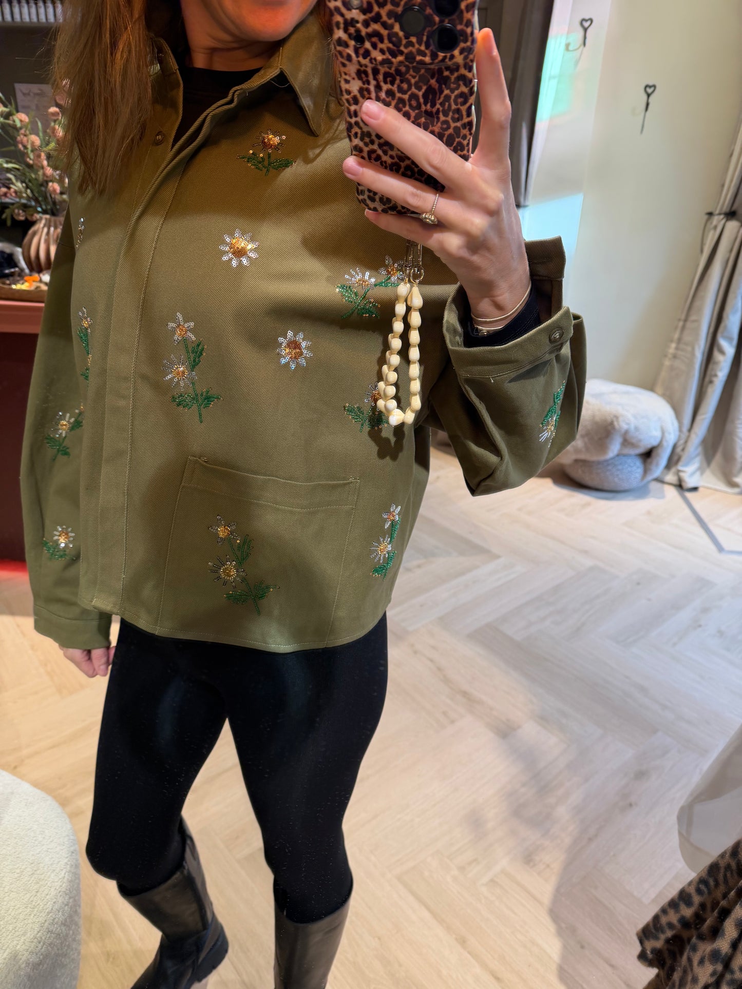 Groen jasje borduur